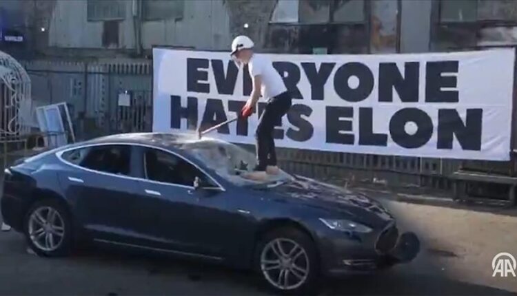 Protesters Smash Tesla in London, Auction Car to Aid Food Banks